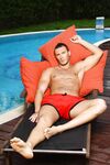 Cute stud Cavin Milano in red shorts