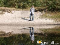 Guy walks in the forest and jerks off his dick under a tree