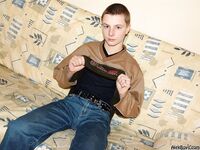 Beautiful twink with a slightly hairy cock posing