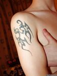 Beautiful twink with a slightly hairy cock posing