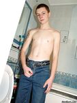 Beautiful twink with a slightly hairy cock posing