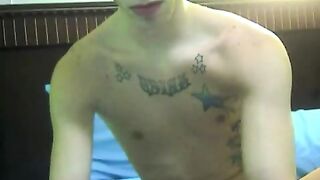 Guy in tattoo masturbates on camera