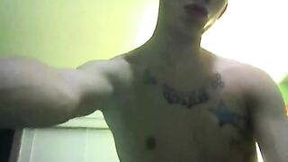 Guy in tattoo masturbates on camera