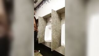 Cruising for sex and breeding a slut at a urinal while being