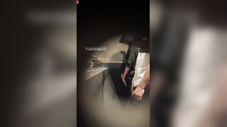 Males are pissing in the toilet.