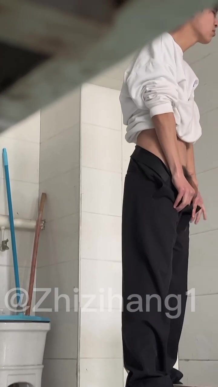 Male students are pissing in the toilet 2