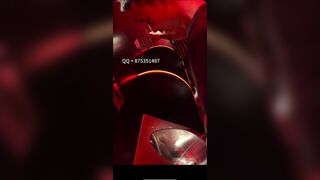 A male is pissing in the toilet.