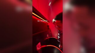 A male is pissing in the toilet.