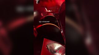 A male is pissing in the toilet.