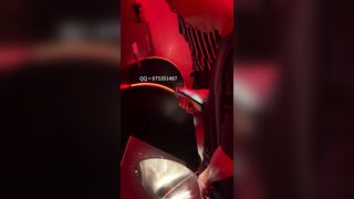 A male is pissing in the toilet.