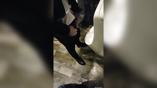 Males are pissing in the toilet 2