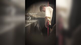 Males are pissing in the toilet.3