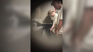 Males are pissing in the toilet.3