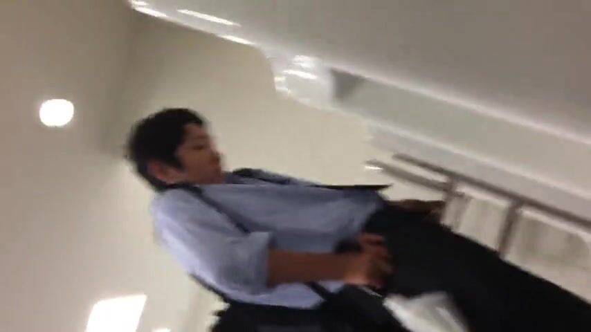 Males are pissing in the toilet.