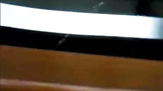 Males are pissing in the toilet.