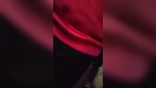 A male is pissing in the toilet.