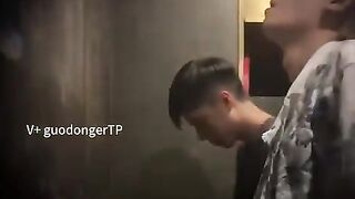 Males are pissing in the toilet.