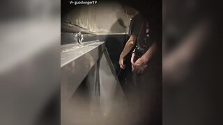 Males are pissing in the toilet.