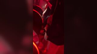 A male is pissing in the toilet.