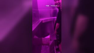 Males are pissing in the toilet.