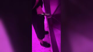 Males are pissing in the toilet.