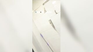 Male students are pissing in the toilet.