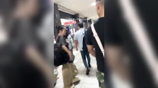 A male is pissing in the toilet.